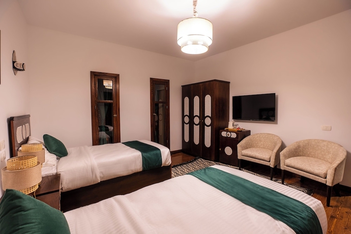 Imagen de la habitación del Hotel Villa Mango. Foto 4