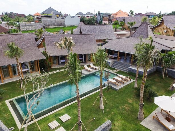 Imagen de la habitación del Hotel Villa Mannao in North Kuta. Foto 20