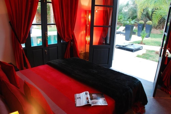 Imagen de la habitación del Hotel Villa Mano. Foto 18