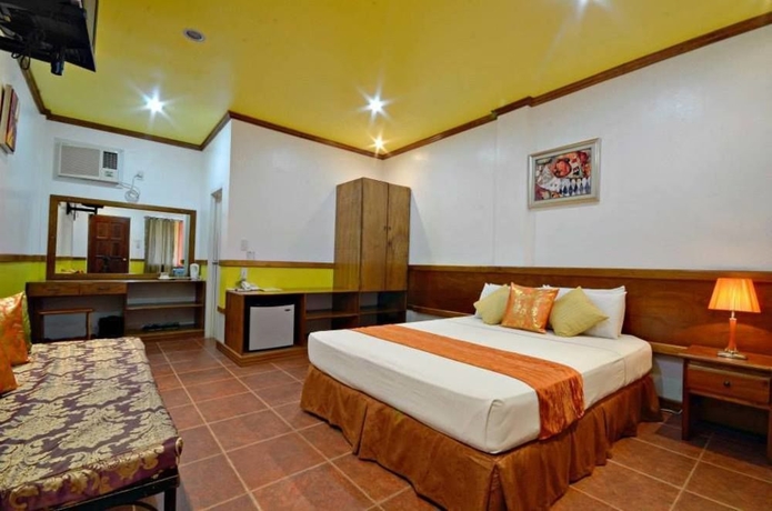Imagen de la habitación del Hotel Villa Manuel Tourist Inn. Foto 2