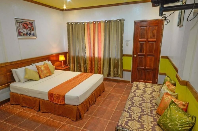 Imagen de la habitación del Hotel Villa Manuel Tourist Inn. Foto 6