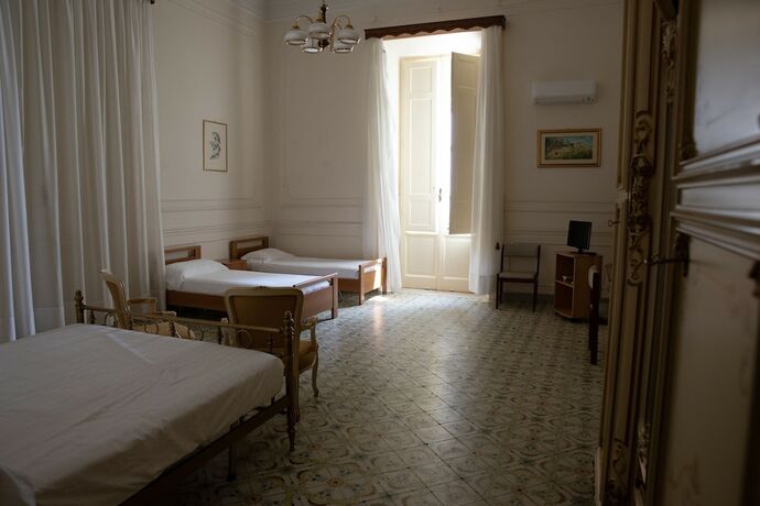 Imagen de la habitación del Hotel Villa Maria Teresa. Foto 14