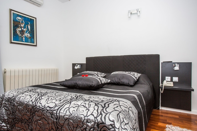 Imagen de la habitación del Hotel Villa Mario. Foto 5