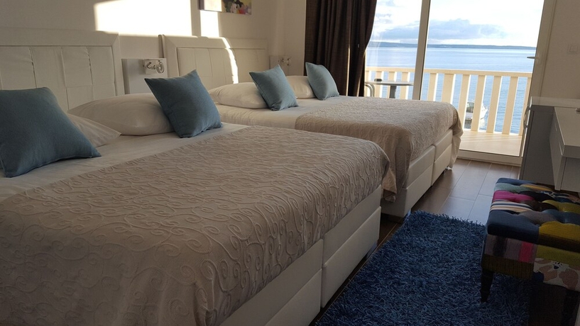 Imagen de la habitación del Hotel Villa Mario. Foto 8