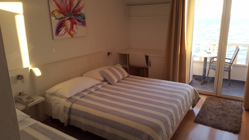 Imagen de la habitación del Hotel Villa Mario. Foto 9