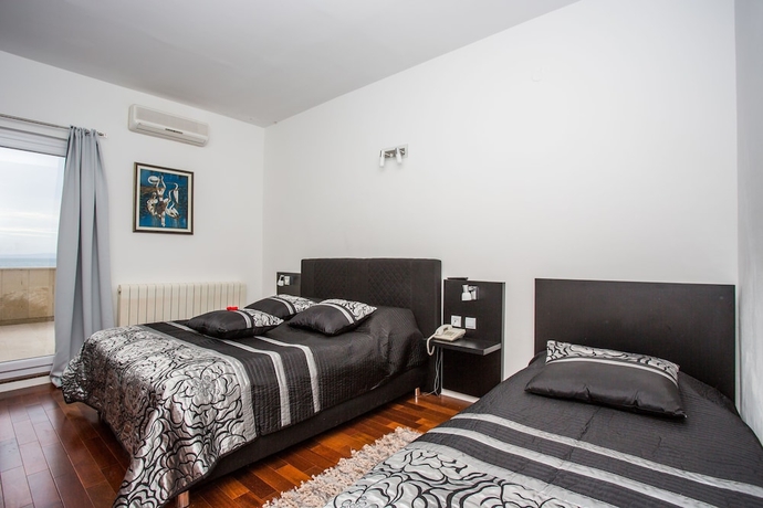 Imagen de la habitación del Hotel Villa Mario. Foto 11