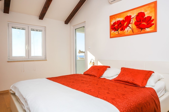 Imagen de la habitación del Hotel Villa Mario. Foto 12