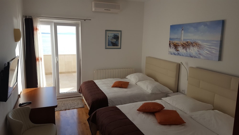 Imagen de la habitación del Hotel Villa Mario. Foto 15