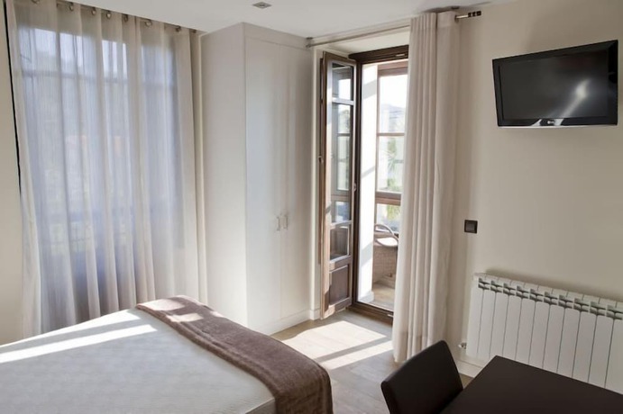 Imagen de la habitación del Hotel Villa Marrón. Foto 3