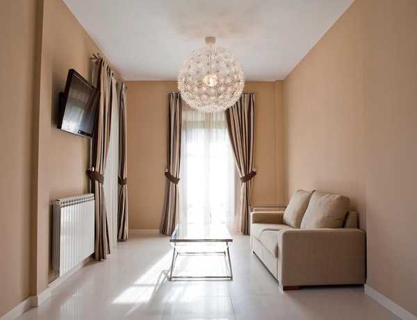 Imagen de la habitación del Hotel Villa Marrón. Foto 10