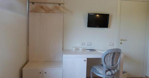 Imagen de la habitación del Hotel Villa Martin. Foto 15