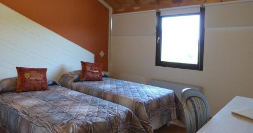 Imagen de la habitación del Hotel Villa Martin. Foto 16
