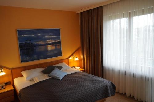 Imagen de la habitación del Hotel Villa Martini Boutiquehotel. Foto 18
