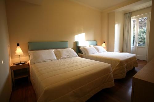Imagen de la habitación del Hotel Villa Martini, Castiglioncello. Foto 8