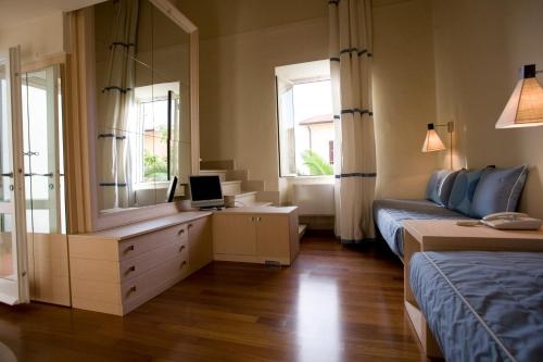 Imagen de la habitación del Hotel Villa Martini, Castiglioncello. Foto 9