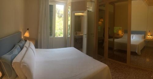Imagen de la habitación del Hotel Villa Martini, Castiglioncello. Foto 10