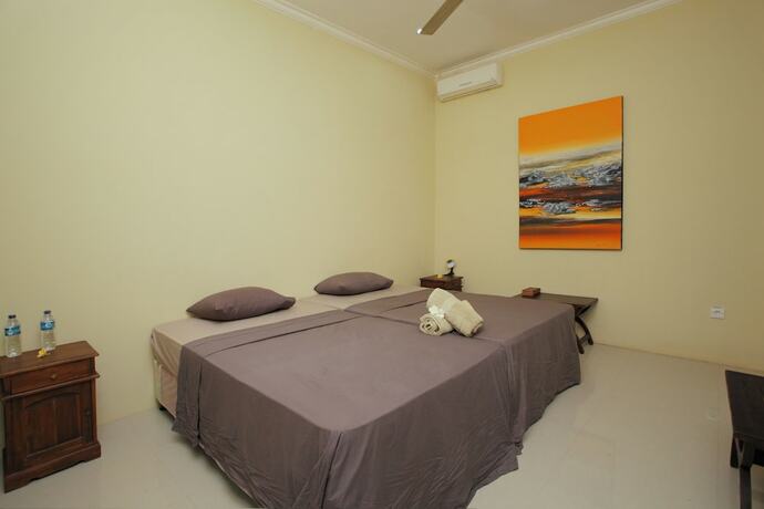 Imagen de la habitación del Hotel Villa Matanai. Foto 17