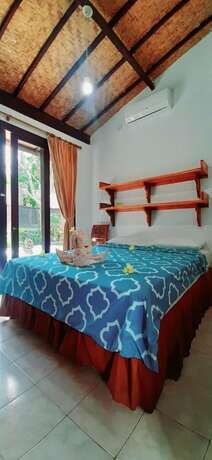 Imagen de la habitación del Hotel Villa Matanai. Foto 19