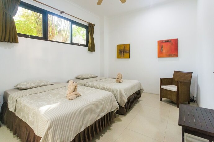 Imagen de la habitación del Hotel Villa Matanai. Foto 20