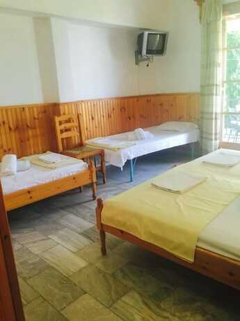 Imagen de la habitación del Hotel Villa Meroulas. Foto 11