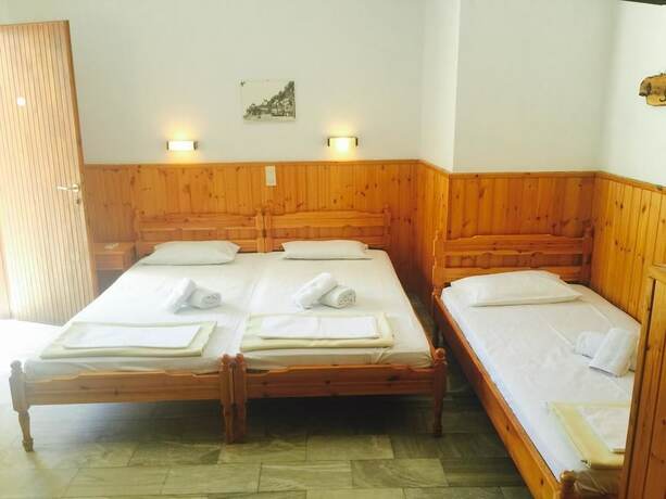 Imagen de la habitación del Hotel Villa Meroulas. Foto 18