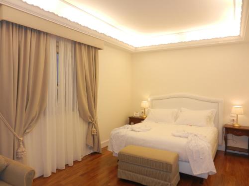 Imagen de la habitación del Hotel Villa Michelangelo, San Martino Bassa. Foto 5