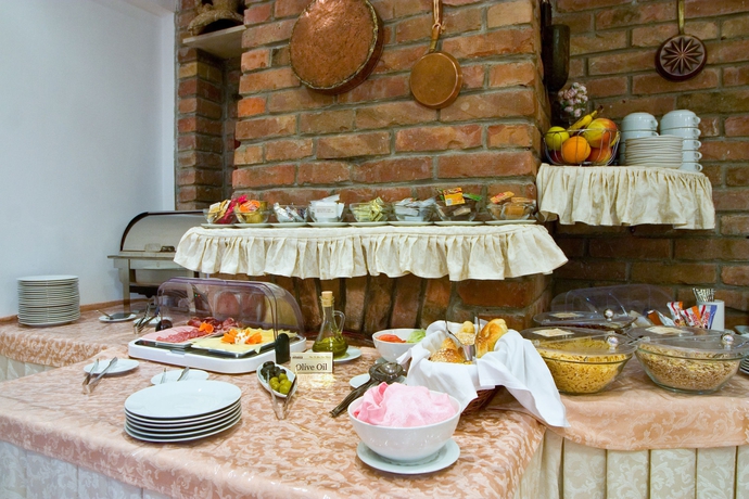 Imagen del bar/restaurante del Hotel Villa Midea. Foto 6