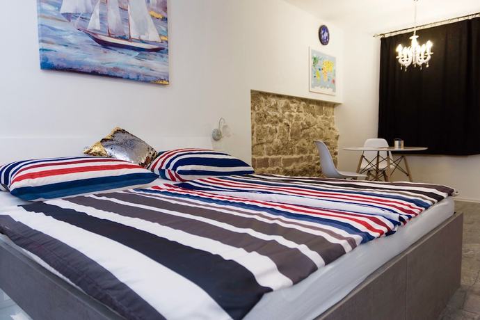 Imagen de la habitación del Hotel Villa Minerva Gardens. Foto 6