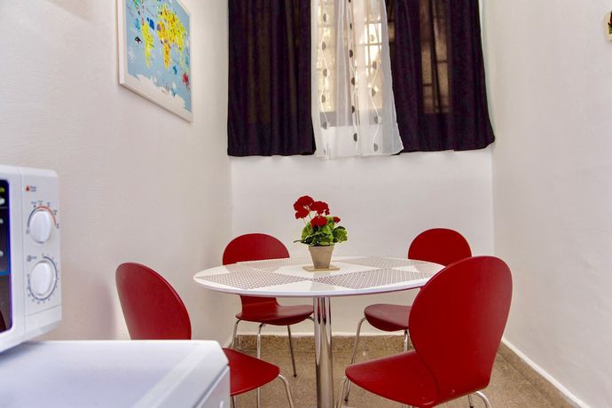 Imagen de la habitación del Hotel Villa Minerva Gardens. Foto 7