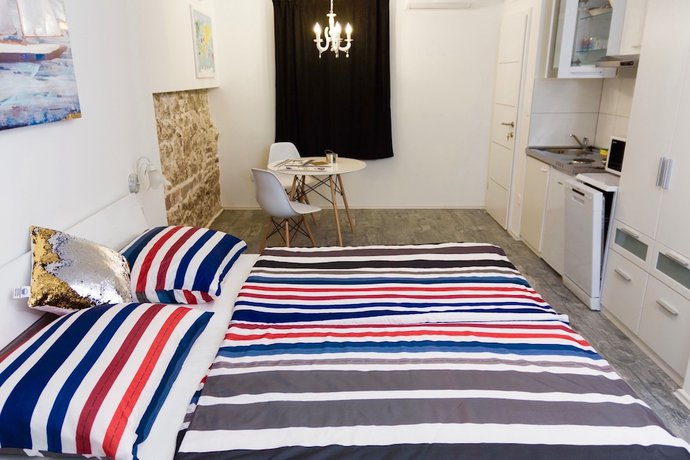 Imagen de la habitación del Hotel Villa Minerva Gardens. Foto 11