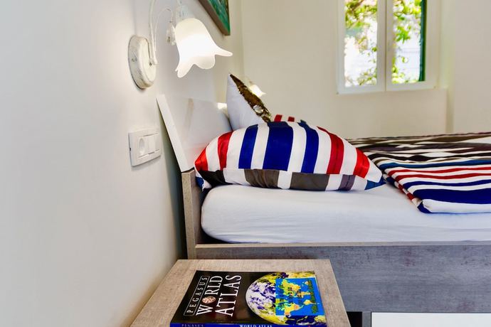 Imagen de la habitación del Hotel Villa Minerva Gardens. Foto 13