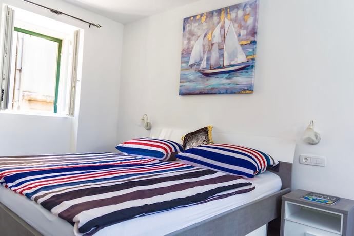 Imagen de la habitación del Hotel Villa Minerva Gardens. Foto 15