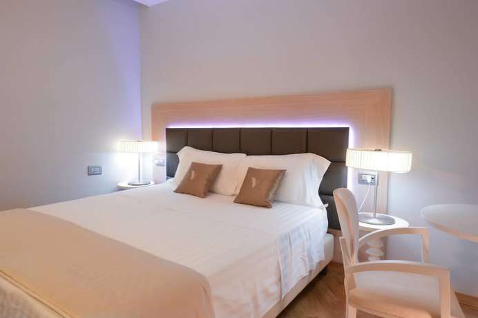 Imagen de la habitación del Hotel Villa Minieri Resort and Spa. Foto 10