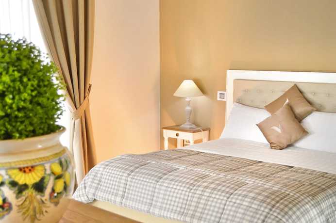 Imagen de la habitación del Hotel Villa Minieri Resort and Spa. Foto 14