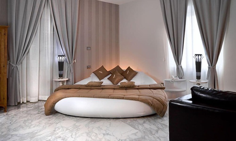 Imagen de la habitación del Hotel Villa Minieri Resort and Spa. Foto 16
