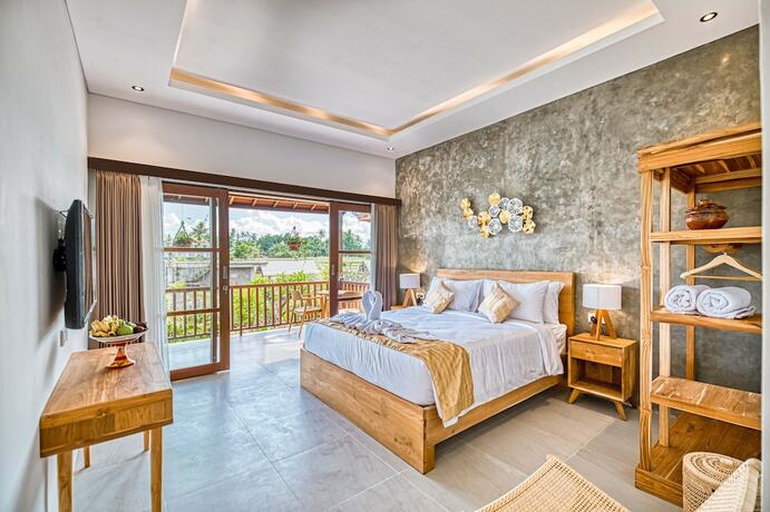 Imagen de la habitación del Hotel Villa Mirah Ubud. Foto 19