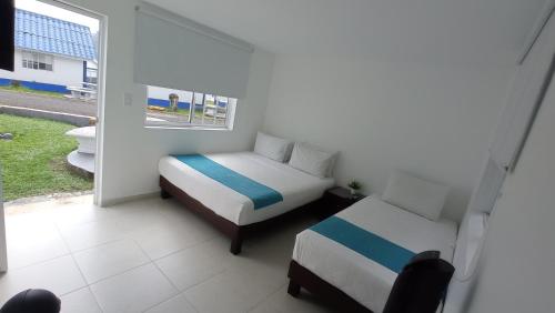 Imagen de la habitación del Hotel Villa M&oacute;naco, Combia. Foto 8