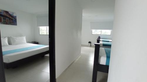Imagen de la habitación del Hotel Villa M&oacute;naco, Combia. Foto 9