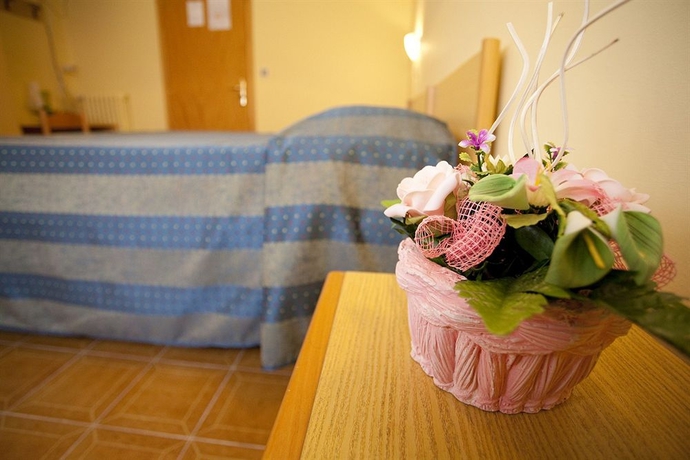 Imagen de la habitación del Hotel Villa Moderna. Foto 10
