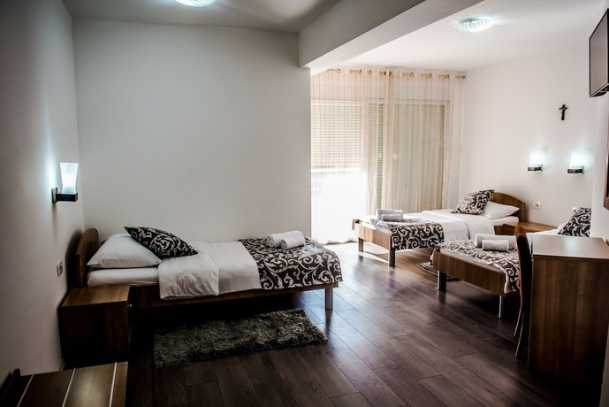 Imagen de la habitación del Hotel Villa Monaco. Foto 9