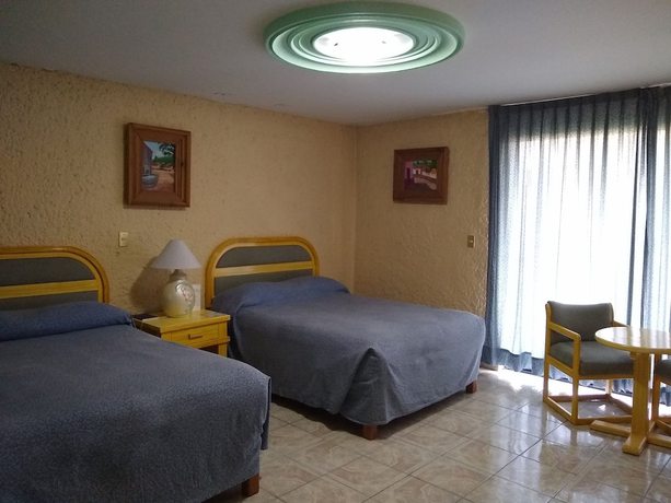 Imagen de la habitación del Hotel Villa Monarca. Foto 4