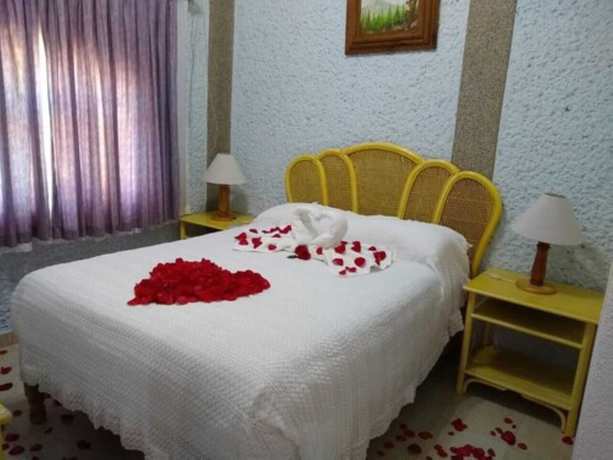 Imagen de la habitación del Hotel Villa Monarca. Foto 9