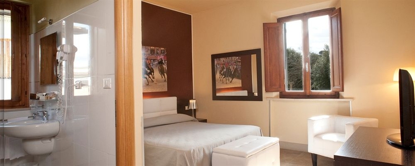 Imagen de la habitación del Hotel Villa Montarioso. Foto 6