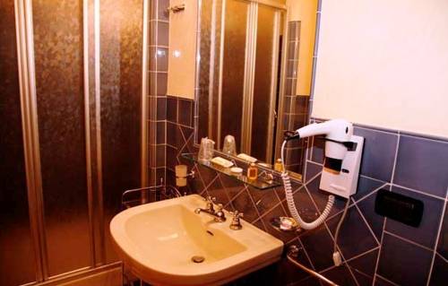 Imagen de la habitación del Hotel Villa Moorings. Foto 7