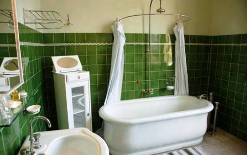 Imagen de la habitación del Hotel Villa Moorings. Foto 8