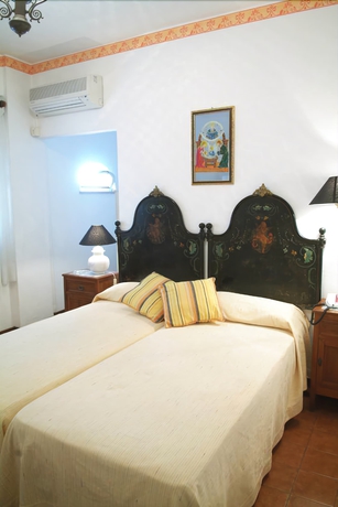 Imagen de la habitación del Hotel Villa Mora. Foto 11