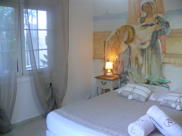 Imagen de la habitación del Hotel Villa Morgane. Foto 1