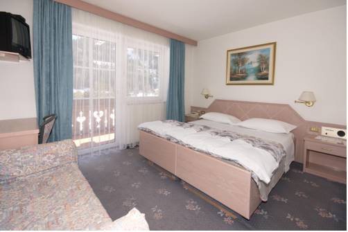 Imagen de la habitación del Hotel Villa Mozart. Foto 14