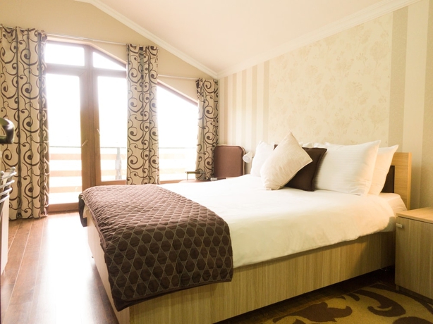 Imagen de la habitación del Hotel Villa Mtashi. Foto 11