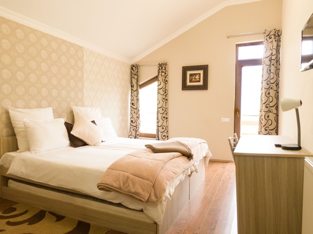 Imagen de la habitación del Hotel Villa Mtashi. Foto 14